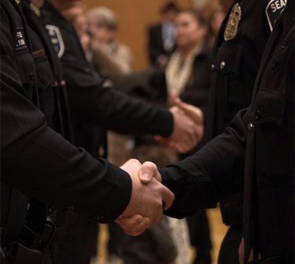 police officers shaking hands